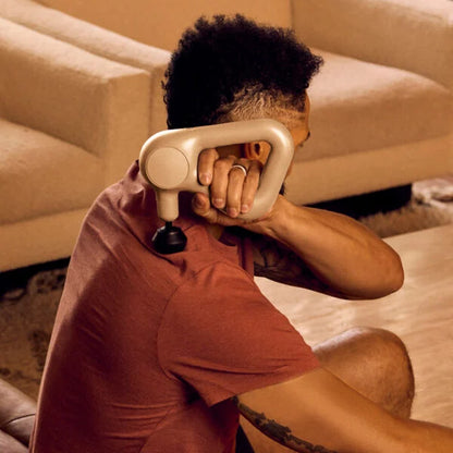 Theragun Relief Massage Gun – Percussive Therapy for Pain Relief & Muscle Recovery